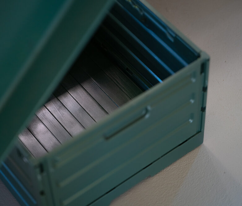 Custom industrial crate designed for automation and optimized storage.